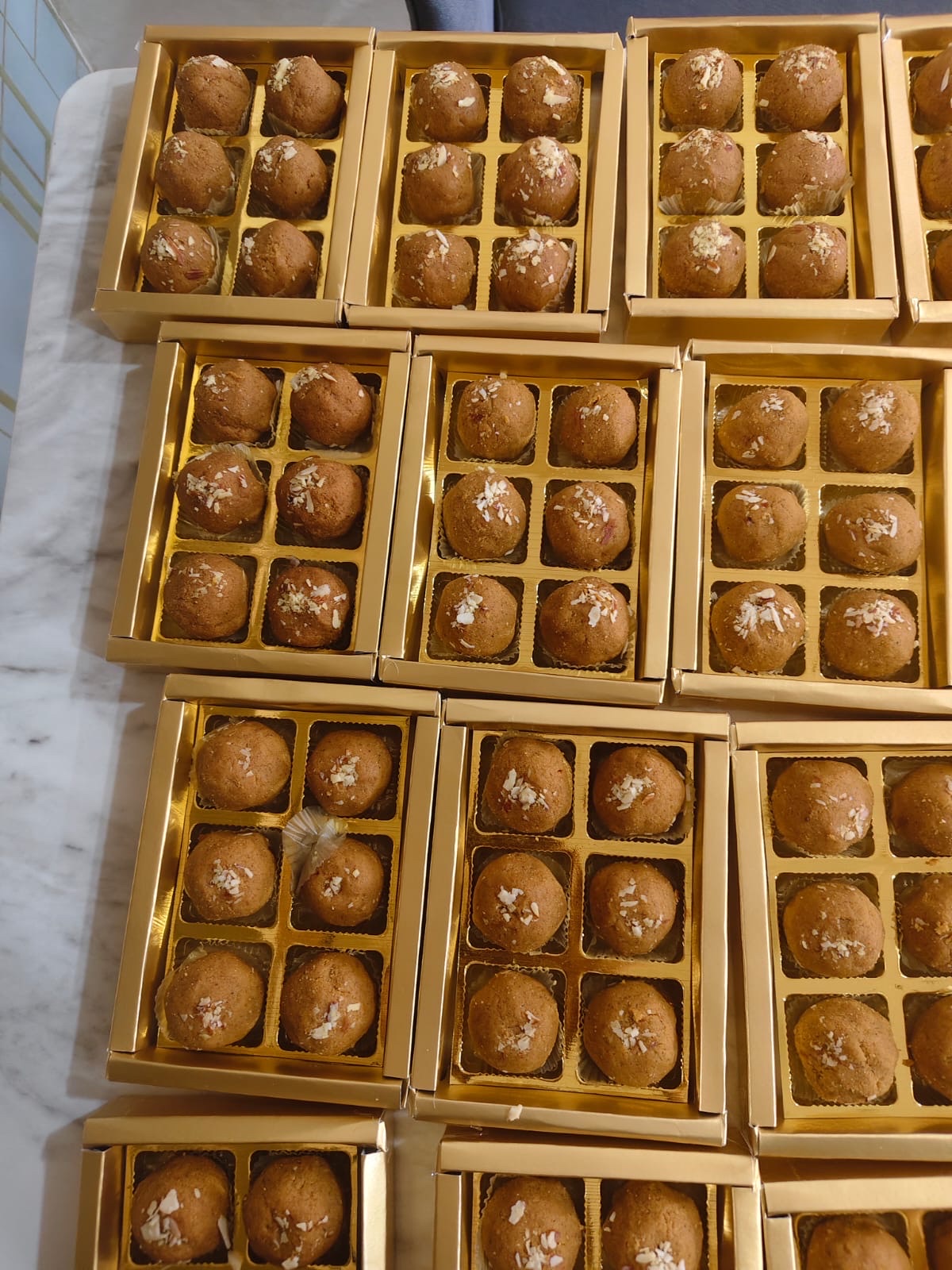Laddoo boxes, styled
